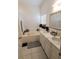 Bathroom with double vanity and garden tub at 714 Hacienda Cir, Kissimmee, FL 34741