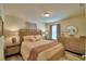 Light and airy bedroom with wood furniture at 1687 Kona Ln, Davenport, FL 33897
