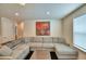 Upstairs loft with sectional sofa and artwork at 1687 Kona Ln, Davenport, FL 33897