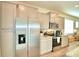 Stainless steel appliances and light colored cabinets in this kitchen at 1687 Kona Ln, Davenport, FL 33897