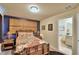 Bedroom with ensuite bathroom and walk-in closet at 1687 Kona Ln, Davenport, FL 33897