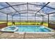 Enjoy the scenic view from this relaxing pool and spa at 1687 Kona Ln, Davenport, FL 33897