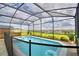 Enjoy this refreshing pool and spa with a screened enclosure at 1687 Kona Ln, Davenport, FL 33897