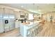 Open concept kitchen with granite countertops and stainless steel appliances at 1687 Kona Ln, Davenport, FL 33897