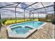 Screened-in pool and spa with a beautiful view at 1687 Kona Ln, Davenport, FL 33897
