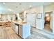 Island kitchen with granite countertops and stainless steel appliances at 1687 Kona Ln, Davenport, FL 33897