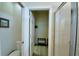 Walk-in closet with ample shelving and hanging space at 1687 Kona Ln, Davenport, FL 33897