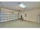 Garage with epoxy floor and storage at 1687 Kona Ln, Davenport, FL 33897