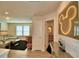 Open loft area with seating, access to bedrooms and bath at 1687 Kona Ln, Davenport, FL 33897