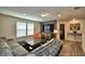 Loft area with sectional sofa and large TV at 1687 Kona Ln, Davenport, FL 33897