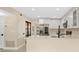 Modern kitchen featuring stainless steel appliances and white cabinetry at 7972 Snowberry Cir, Orlando, FL 32819