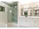 Spa-like bathroom with a frameless shower and gray tile at 7972 Snowberry Cir, Orlando, FL 32819
