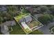 Aerial view showcasing a two-story house and yard at 7972 Snowberry Cir, Orlando, FL 32819