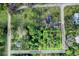 Aerial view of a vacant lot situated between two streets at 110 W Railway Ave, Oakland, FL 34760