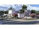 Community clubhouse with outdoor seating and landscaping at 110 W Railway Ave, Oakland, FL 34760