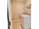 Laundry room with washer, dryer, and shelving at 15102 Stuttgart Aly, Winter Garden, FL 34787