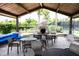 Relaxing outdoor patio with fireplace and seating areas at 15102 Stuttgart Aly, Winter Garden, FL 34787