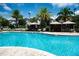 Expansive community pool with plenty of lounge chairs at 15102 Stuttgart Aly, Winter Garden, FL 34787