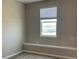 Bedroom with window, neutral walls, and window seat at 15102 Stuttgart Aly, Winter Garden, FL 34787