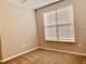 Bright bedroom with neutral walls and carpeted floors at 15102 Stuttgart Aly, Winter Garden, FL 34787