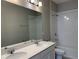 Double vanity bathroom with bathtub and toilet at 15102 Stuttgart Aly, Winter Garden, FL 34787