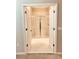 Bathroom with a large walk-in shower and tiled walls at 15102 Stuttgart Aly, Winter Garden, FL 34787