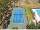 Aerial view of a community tennis court at 145 Cork Way, Davenport, FL 33897