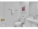 Clean and simple half bathroom at 145 Cork Way, Davenport, FL 33897