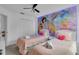 bedroom with twin beds and Disney princess mural at 145 Cork Way, Davenport, FL 33897