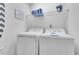 Convenient laundry room with washer and dryer at 145 Cork Way, Davenport, FL 33897