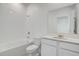 Clean bathroom with white vanity and bathtub at 687 Hitch Loop, Saint Cloud, FL 34772