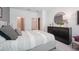 Comfortable bedroom with ensuite bathroom and walk-in closet at 33251 Country House Dr, Sorrento, FL 32776