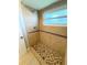 Large walk-in shower with tiled walls and floor at 307 Colonade Ct, Kissimmee, FL 34758