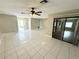 Open living area with tile floors and lots of natural light at 307 Colonade Ct, Kissimmee, FL 34758