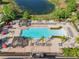 Enjoy this community pool with a lake view at 547 Marcello Blvd, Kissimmee, FL 34746