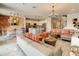 Open floor plan with living room, kitchen, and dining area at 547 Marcello Blvd, Kissimmee, FL 34746