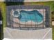 Bird's-eye view of the home's private pool and spa at 547 Marcello Blvd, Kissimmee, FL 34746