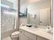 Clean bathroom with shower/tub combo, vanity with quartz countertop at 547 Marcello Blvd, Kissimmee, FL 34746