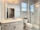 Bathroom with walk-in shower, vanity with quartz countertop at 547 Marcello Blvd, Kissimmee, FL 34746