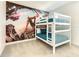 White bunk beds and Spiderman themed wall mural at 547 Marcello Blvd, Kissimmee, FL 34746