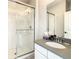 Bathroom with a walk-in shower and modern vanity at 547 Marcello Blvd, Kissimmee, FL 34746