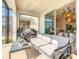 Relaxing screened patio with comfortable seating and grill at 547 Marcello Blvd, Kissimmee, FL 34746