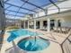 Enjoy this screened pool and spa at 547 Marcello Blvd, Kissimmee, FL 34746