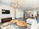Modern living room featuring a large sectional sofa and flat-screen TV at 547 Marcello Blvd, Kissimmee, FL 34746