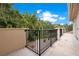 Balcony overlooking the backyard with lush landscaping at 5174 Vardon Dr, Windermere, FL 34786