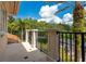 Private balcony overlooking a tree-lined street at 5174 Vardon Dr, Windermere, FL 34786
