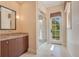 Spa-like bathroom with a large shower and private balcony access at 5174 Vardon Dr, Windermere, FL 34786