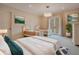 Large bedroom with two twin beds and access to a private balcony at 5174 Vardon Dr, Windermere, FL 34786