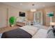 Spacious bedroom with two twin beds and access to a private balcony at 5174 Vardon Dr, Windermere, FL 34786