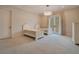 Bedroom with two twin beds and private balcony access at 5174 Vardon Dr, Windermere, FL 34786